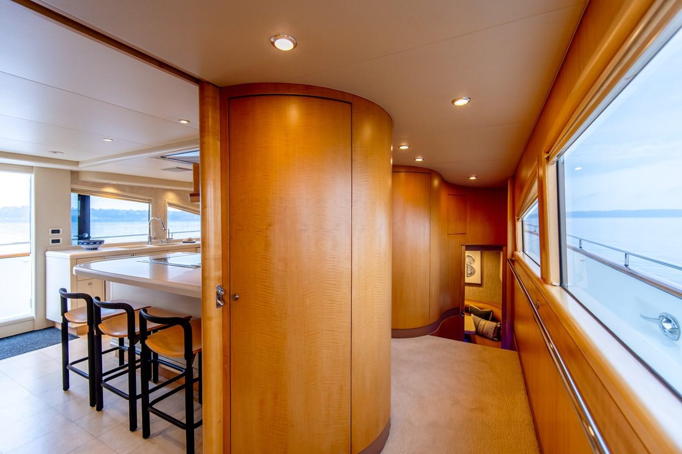 a room with a table and chairs aboard SHADOWFAX Yacht for Sale