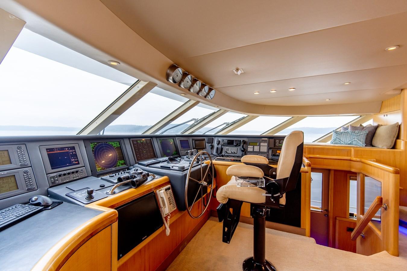 a control room with a chair and computer aboard SHADOWFAX Yacht for Sale