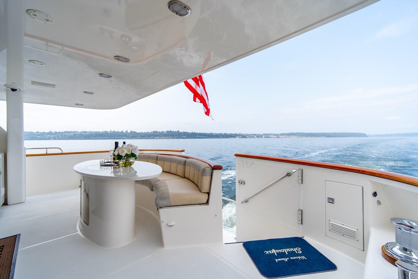 a room with a table and chairs aboard SHADOWFAX Yacht for Sale