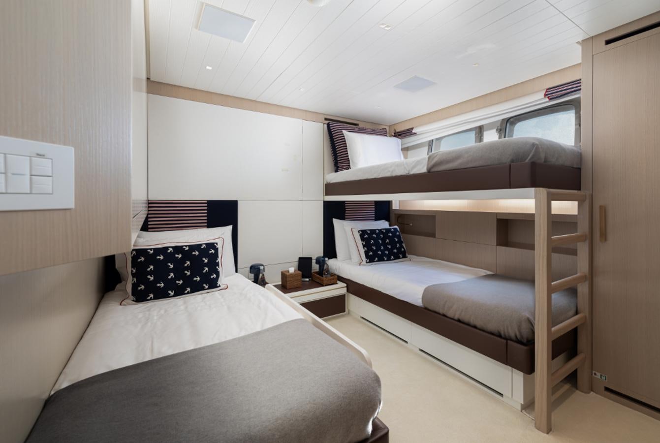 a room with two beds aboard MONTE-CRISTO Yacht for Sale