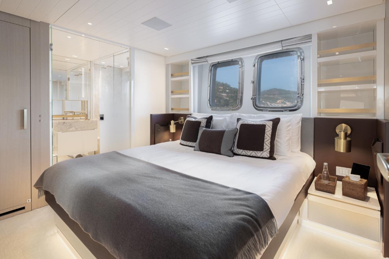 a bedroom with a large bed aboard MONTE-CRISTO Yacht for Sale