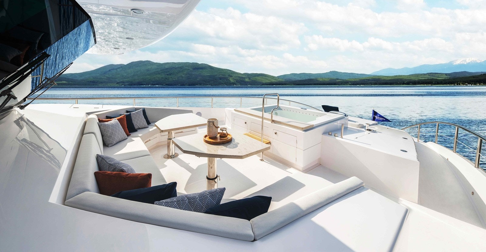 a white yacht on a body of water aboard HORIZON FD110 TRI-DECK / DELIVERY EARLY 2024 Yacht for Sale