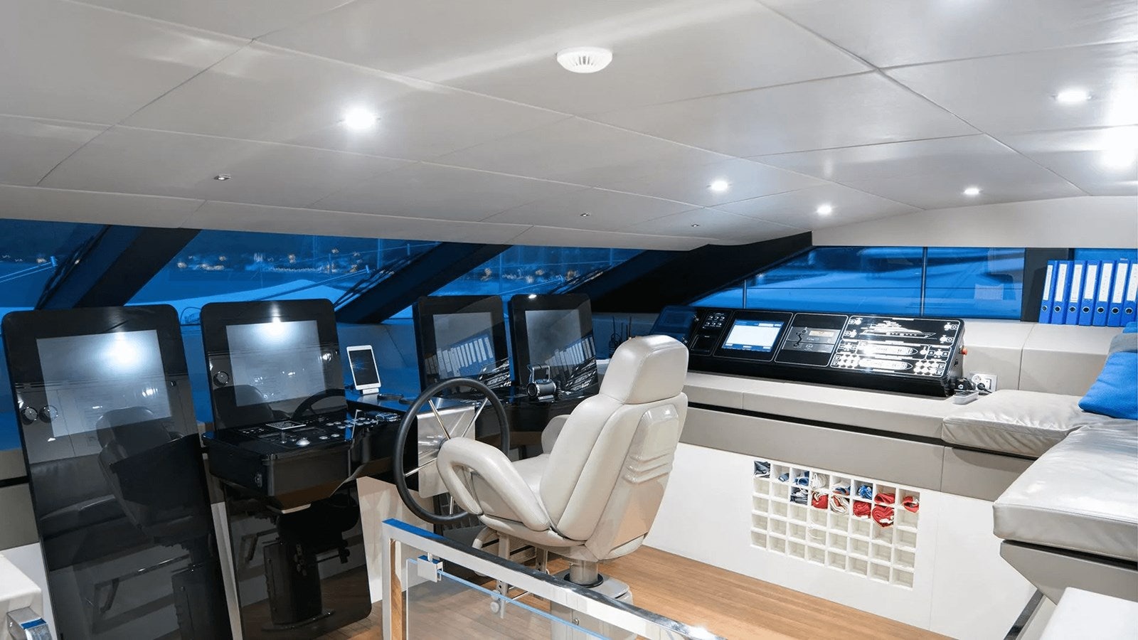 a room with computers and chairs aboard 2018 SANLORENZO SL118 #614 Yacht for Sale