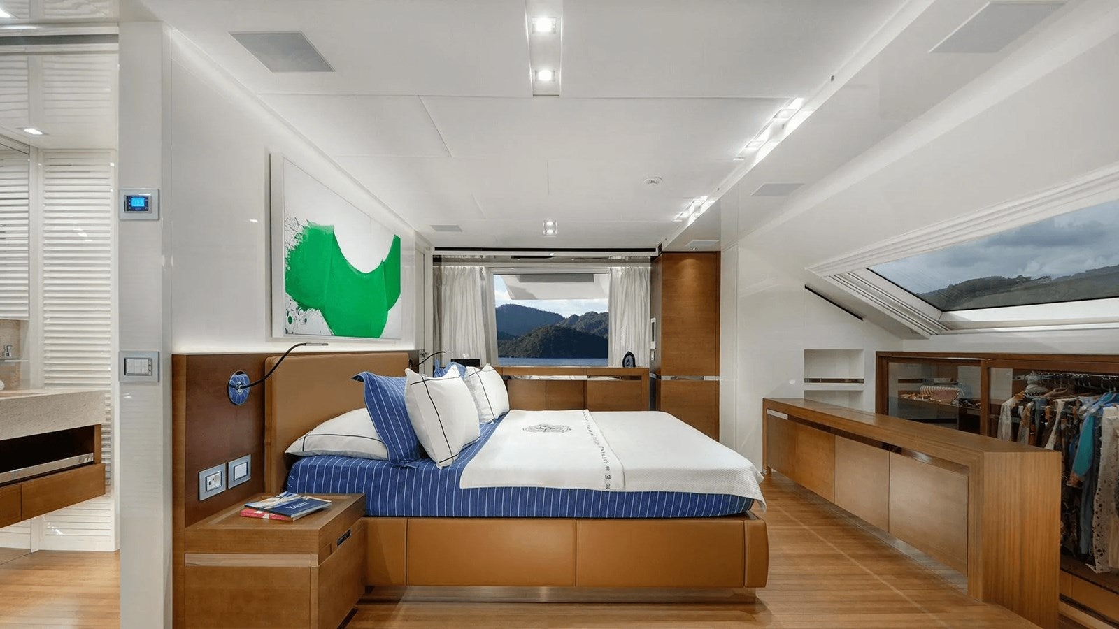 a bedroom with a bed and a desk aboard 2018 SANLORENZO SL118 #614 Yacht for Sale