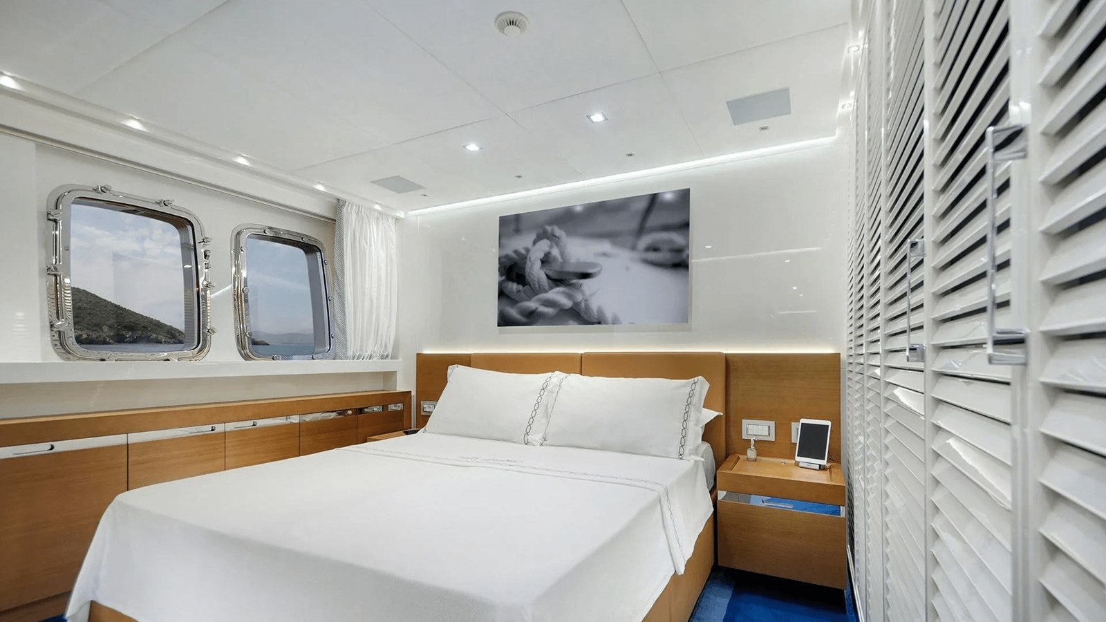a bedroom with a large mirror aboard 2018 SANLORENZO SL118 #614 Yacht for Sale