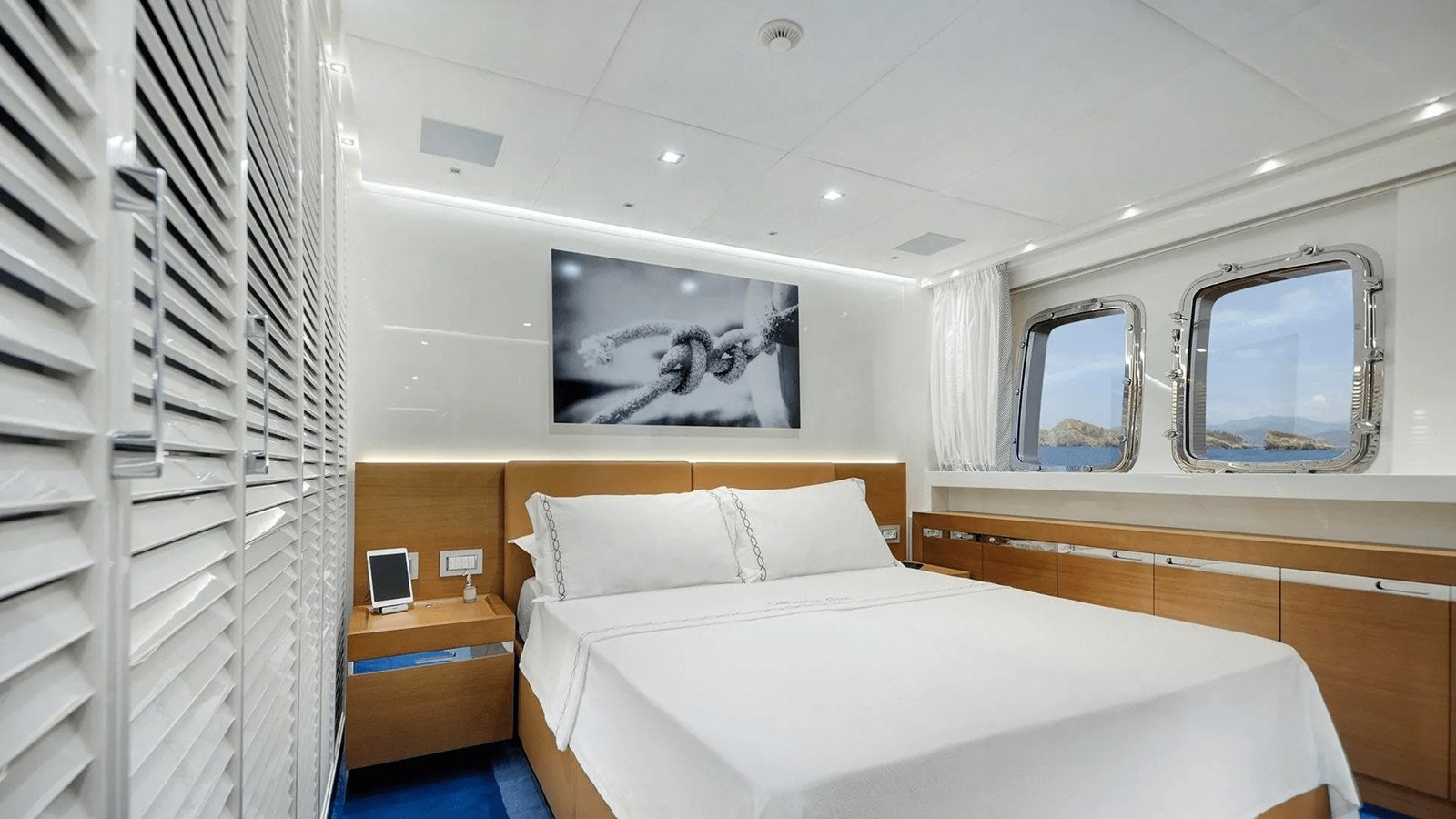 a bedroom with a bed and a mirror aboard 2018 SANLORENZO SL118 #614 Yacht for Sale