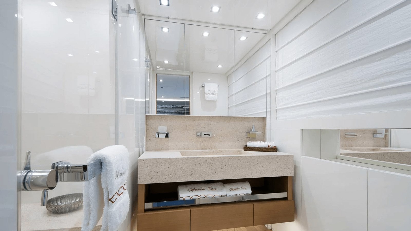 a bathroom with a sink and a mirror aboard 2018 SANLORENZO SL118 #614 Yacht for Sale