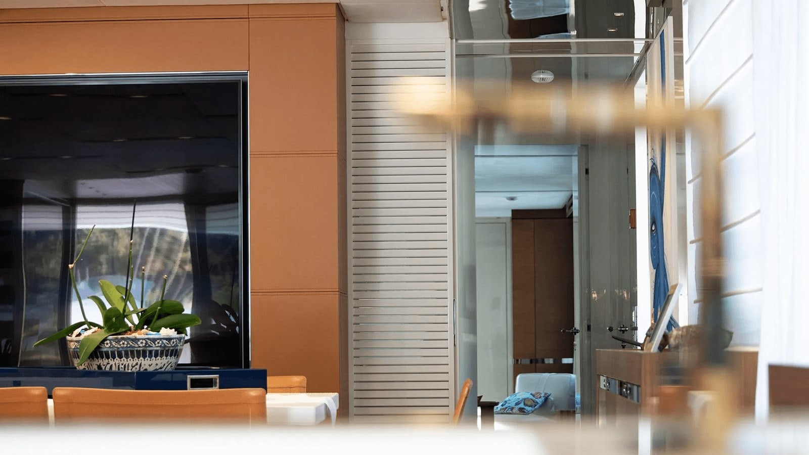 a room with a plant and a window aboard 2018 SANLORENZO SL118 #614 Yacht for Sale