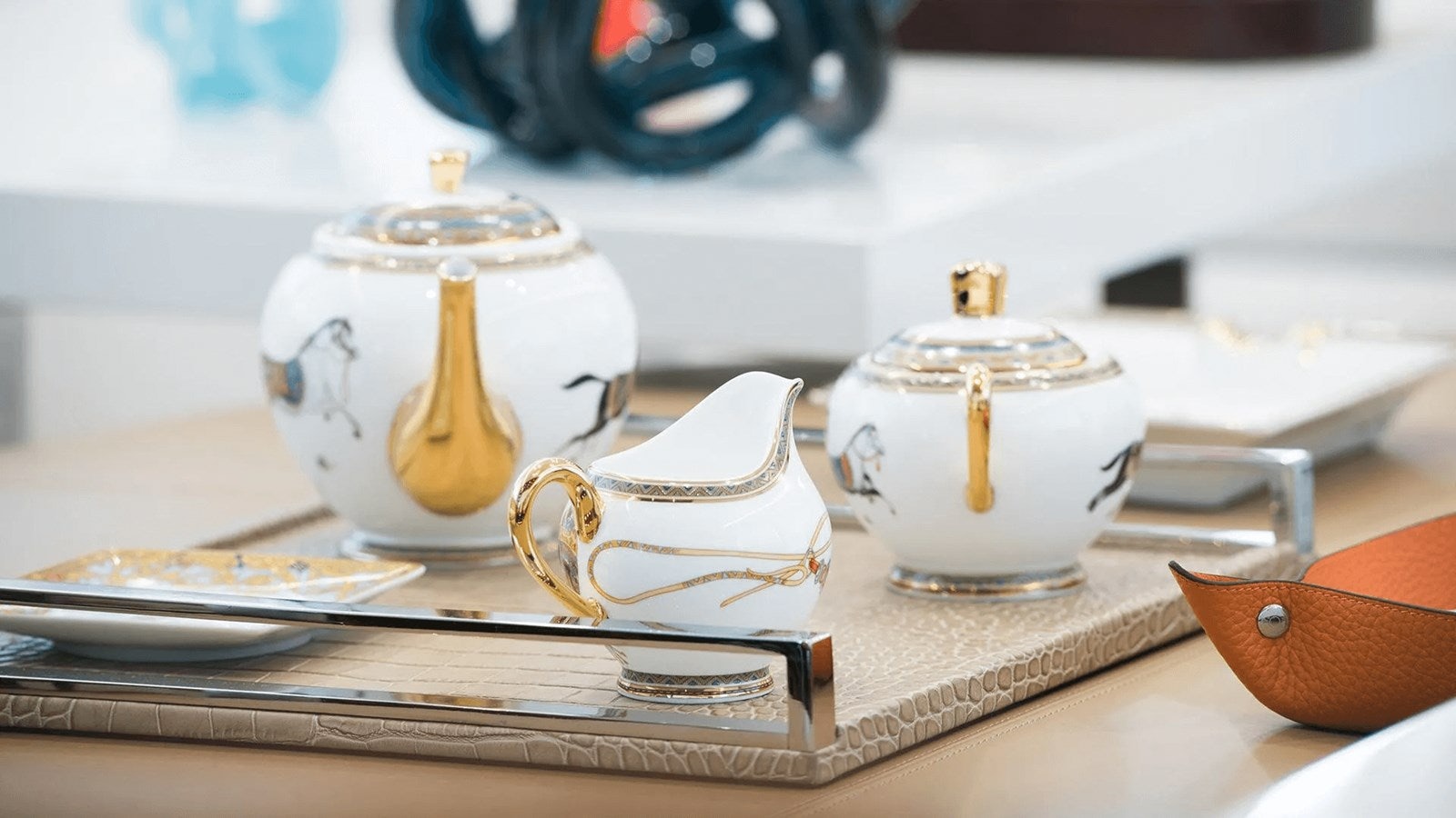 a group of teapots and teapots on a table aboard 2018 SANLORENZO SL118 #614 Yacht for Sale