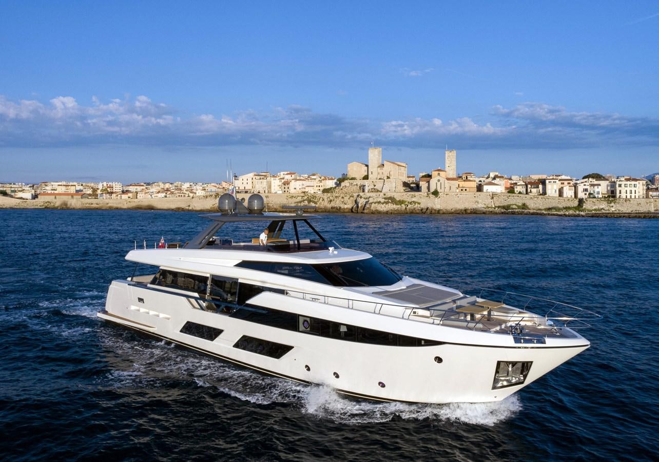 a white yacht in the water aboard L'OPERA Yacht for Sale