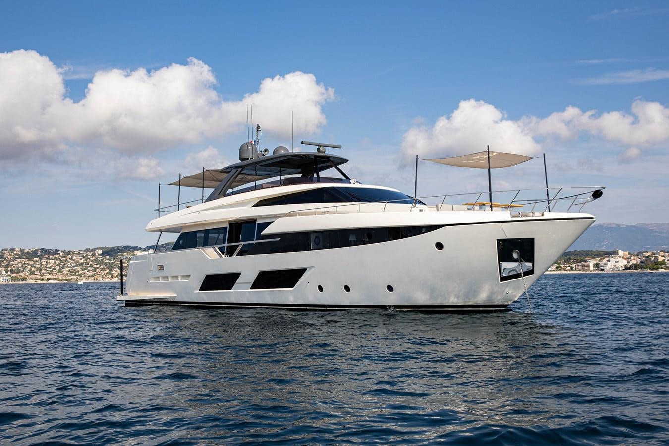 a white yacht in the water aboard L'OPERA Yacht for Sale