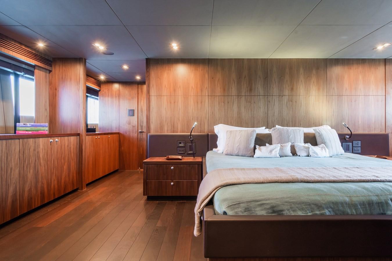 a bed in a room aboard DESEO Yacht for Sale