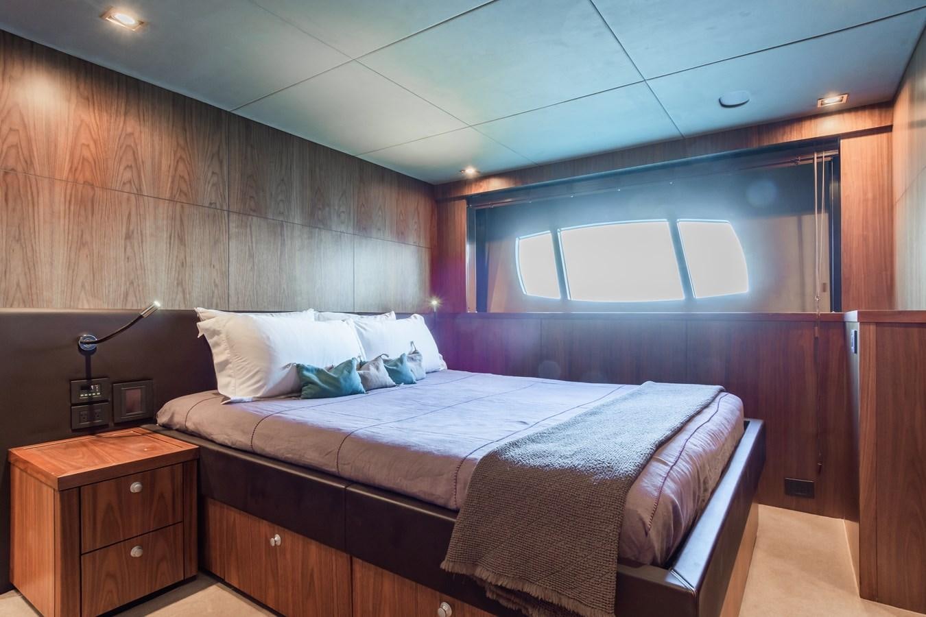 a bed in a room aboard DESEO Yacht for Sale
