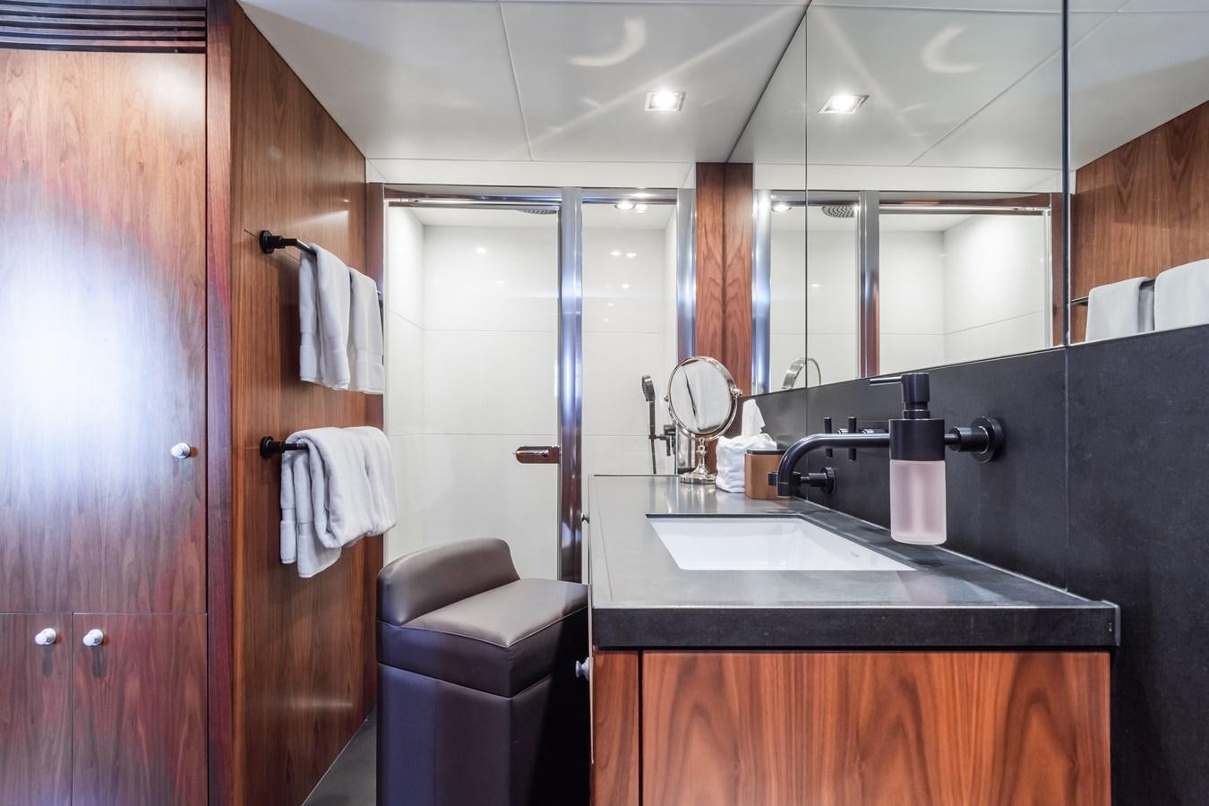 a bathroom with a sink and a mirror aboard DESEO Yacht for Sale