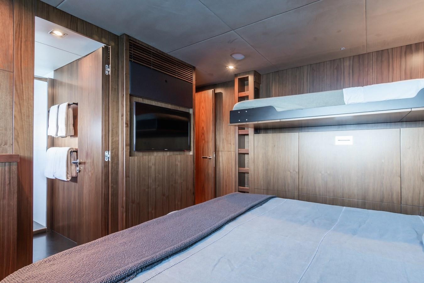 a bed in a room aboard DESEO Yacht for Sale