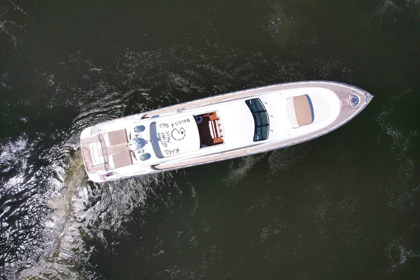 a boat floating in the water aboard 108' MANGUSTA 2002 Yacht for Sale