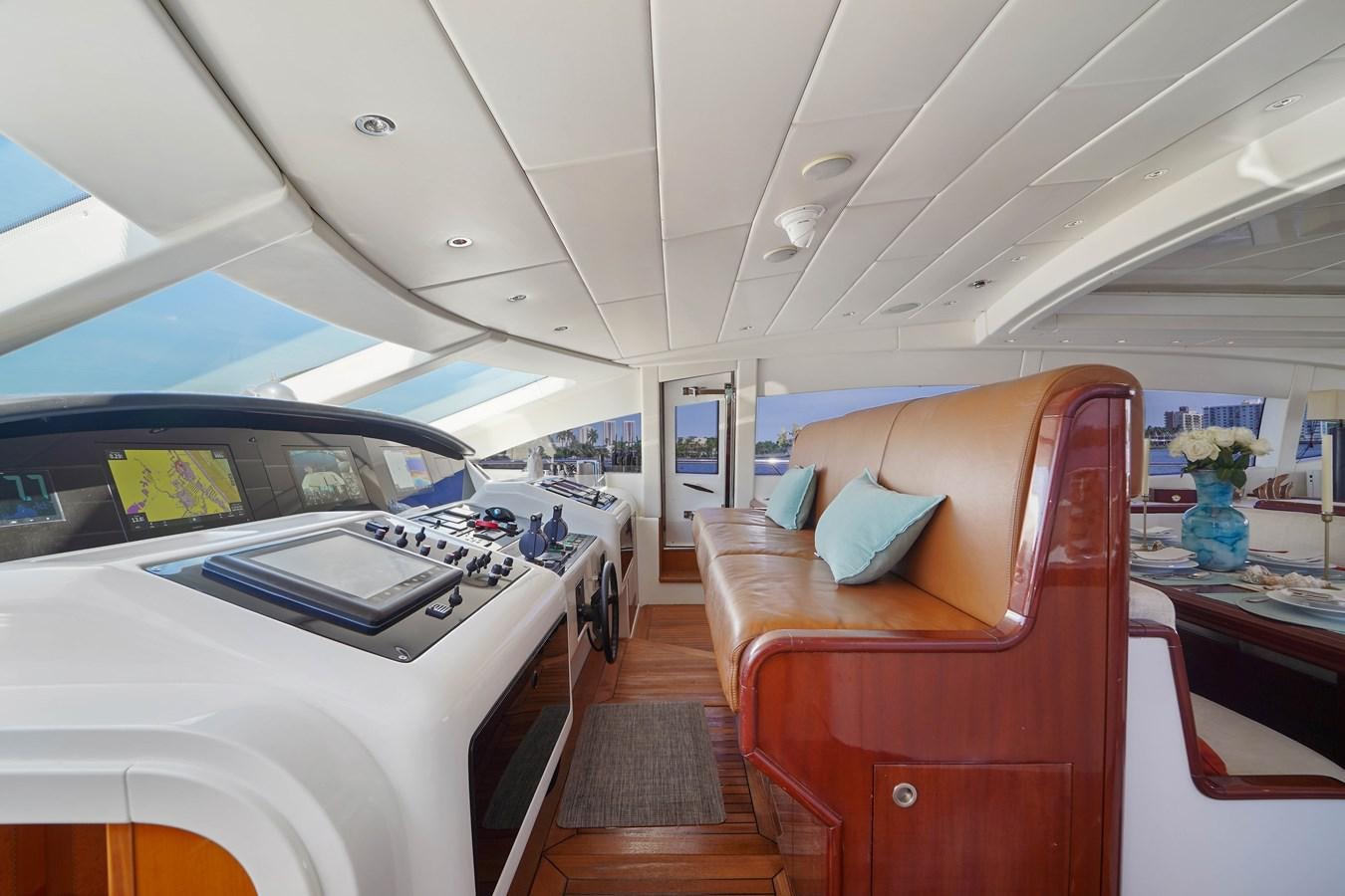 inside of a car aboard 108' MANGUSTA 2002 Yacht for Sale