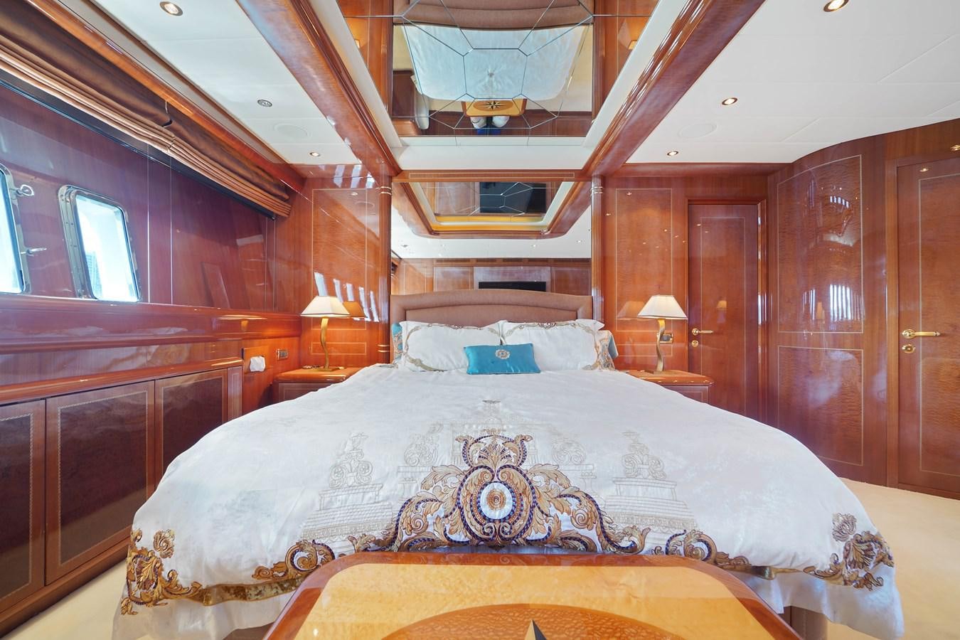 a bed with a canopy aboard 108' MANGUSTA 2002 Yacht for Sale