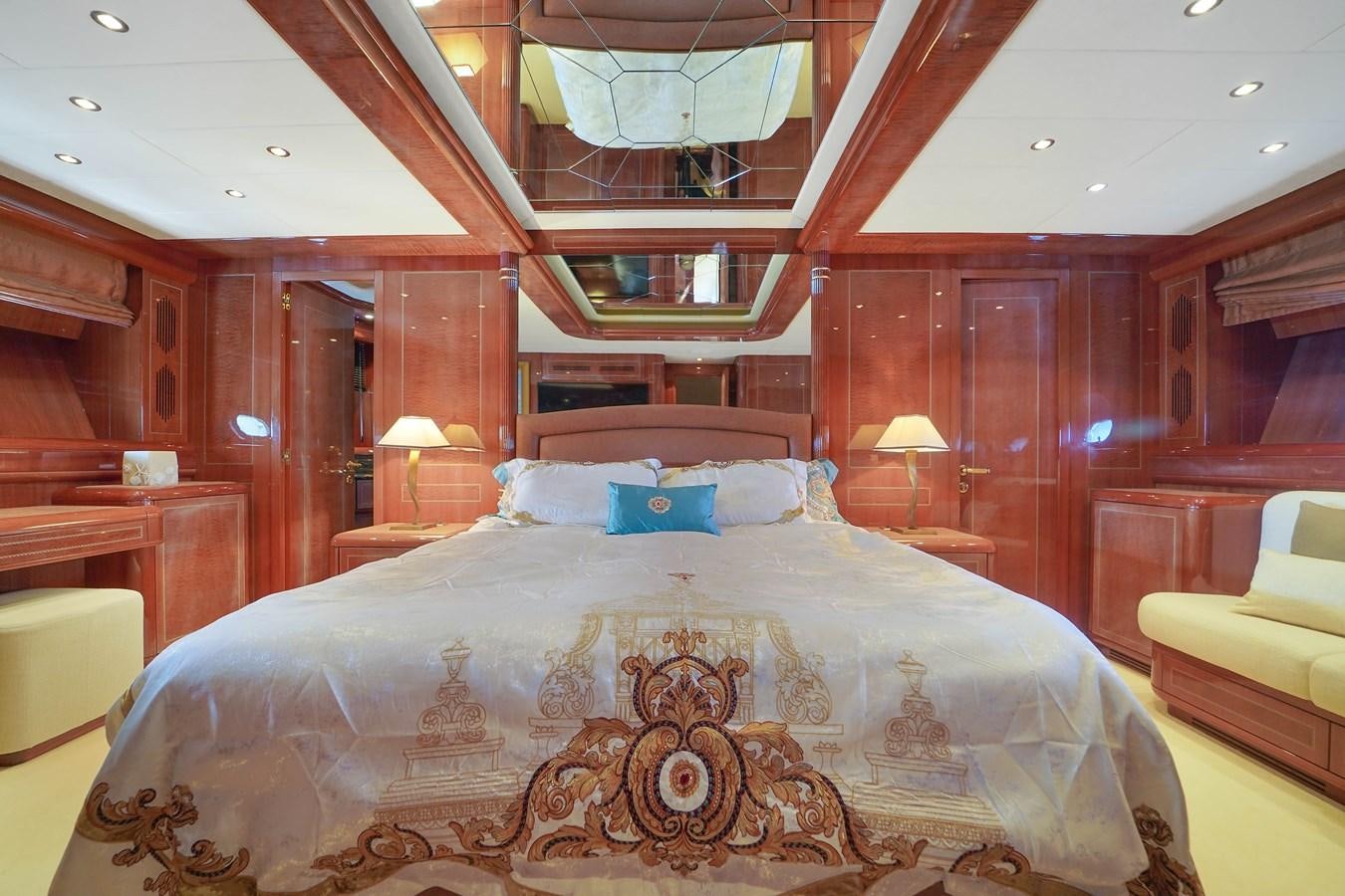 a bed with a canopy aboard 108' MANGUSTA 2002 Yacht for Sale