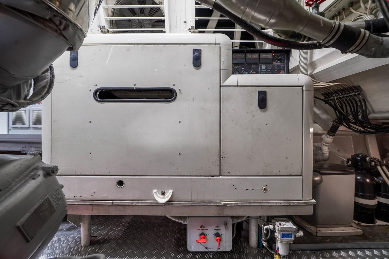 a large metal machine aboard 108' MANGUSTA 2002 Yacht for Sale