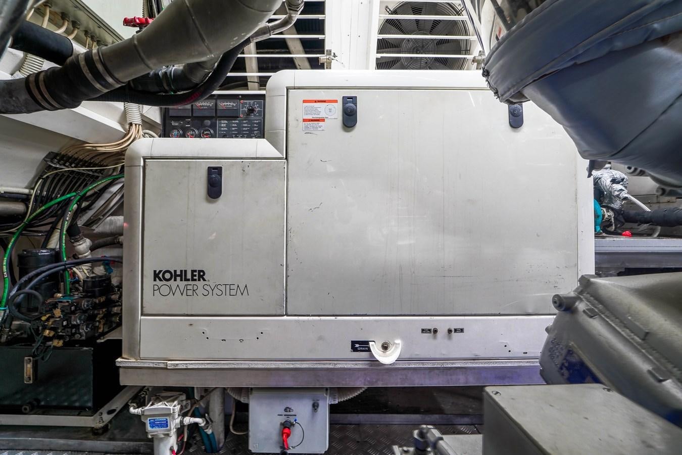 a large metal box with a red label on it aboard 108' MANGUSTA 2002 Yacht for Sale