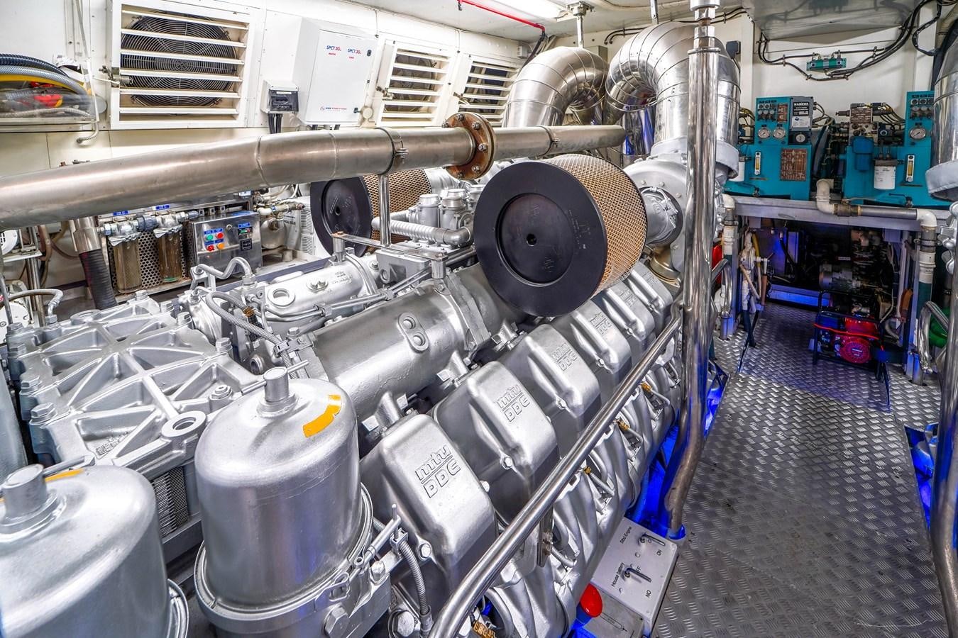 a large factory machinery aboard 108' MANGUSTA 2002 Yacht for Sale