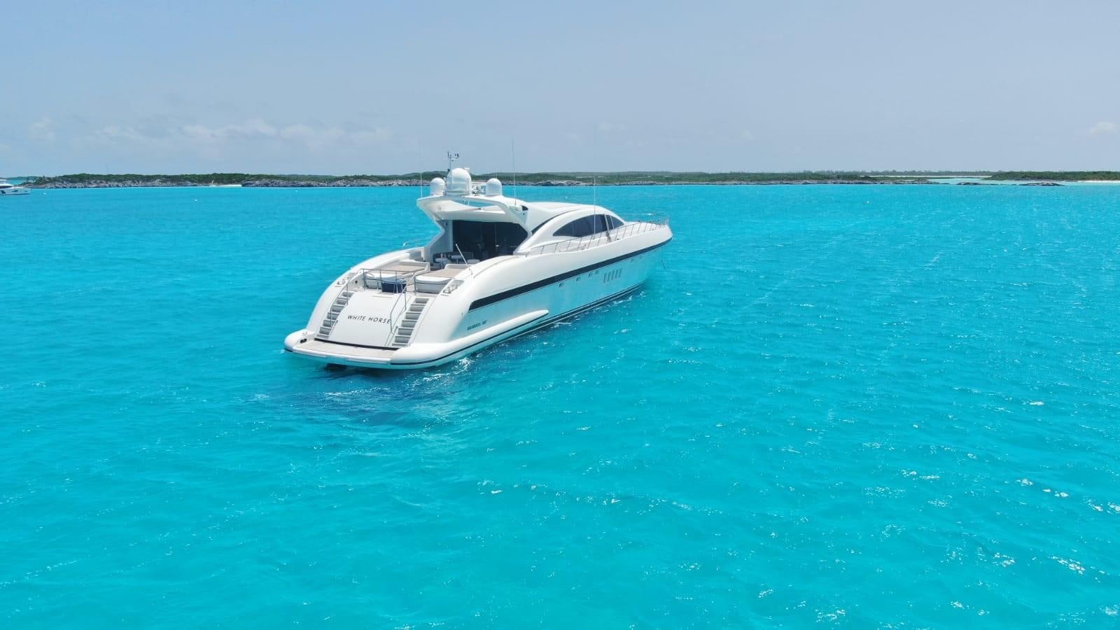 a boat in the water aboard 108' MANGUSTA 2002 Yacht for Sale