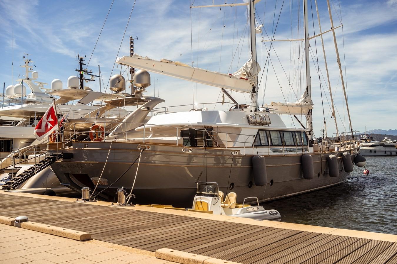 a large ship docked aboard ONE FORCE Yacht for Sale