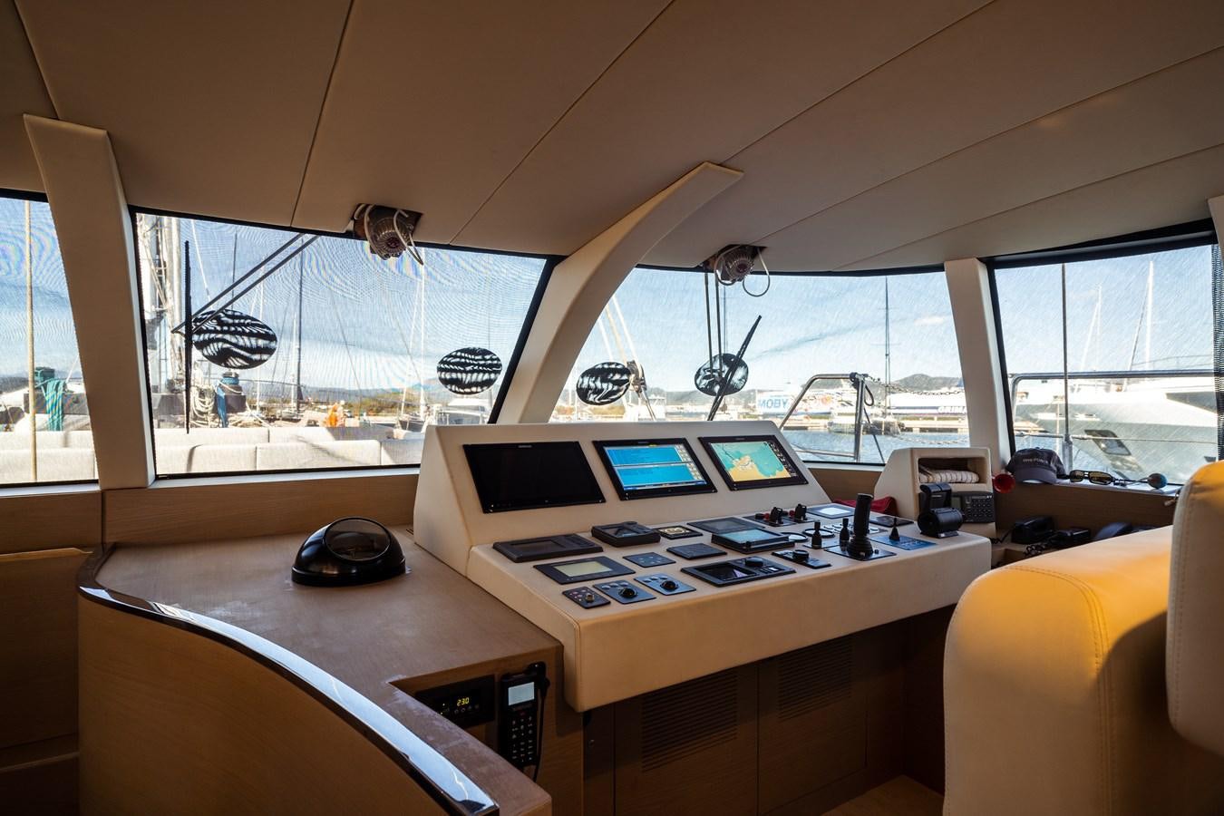 a room with a desk and a computer aboard ONE FORCE Yacht for Sale