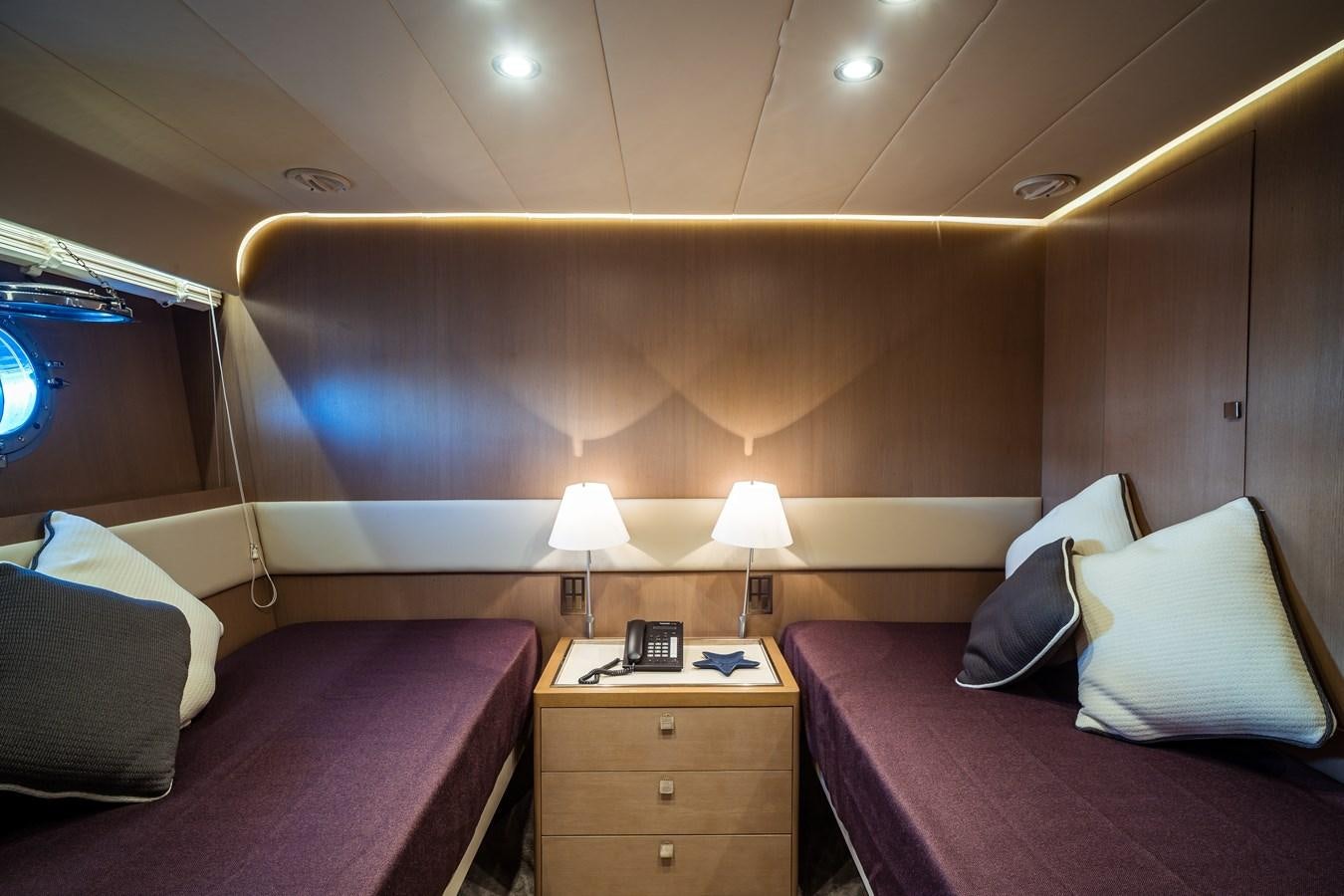 a room with two beds aboard ONE FORCE Yacht for Sale