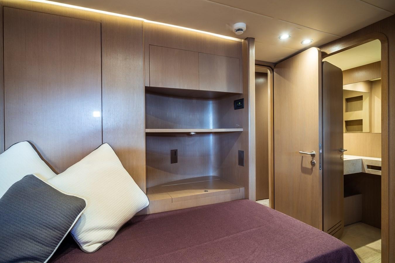 a bed in a room aboard ONE FORCE Yacht for Sale