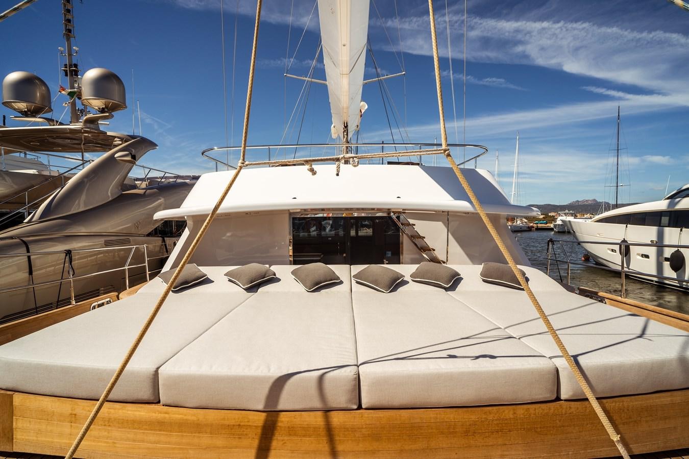 a boat docked at a pier aboard ONE FORCE Yacht for Sale