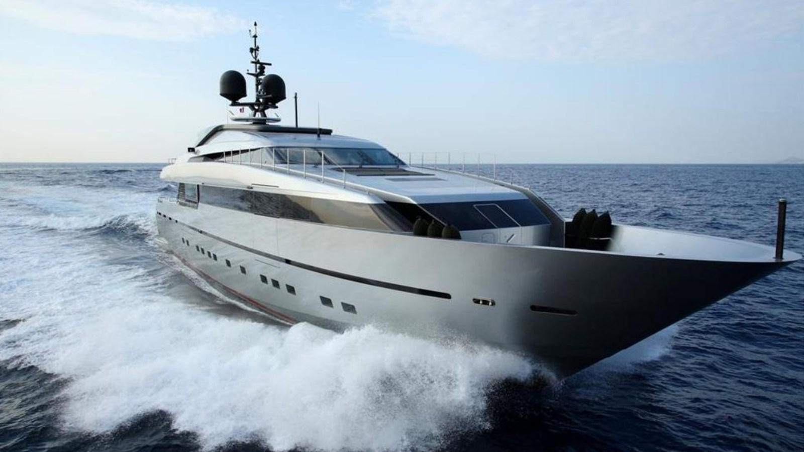 a white yacht on the water aboard NAIA Yacht for Sale