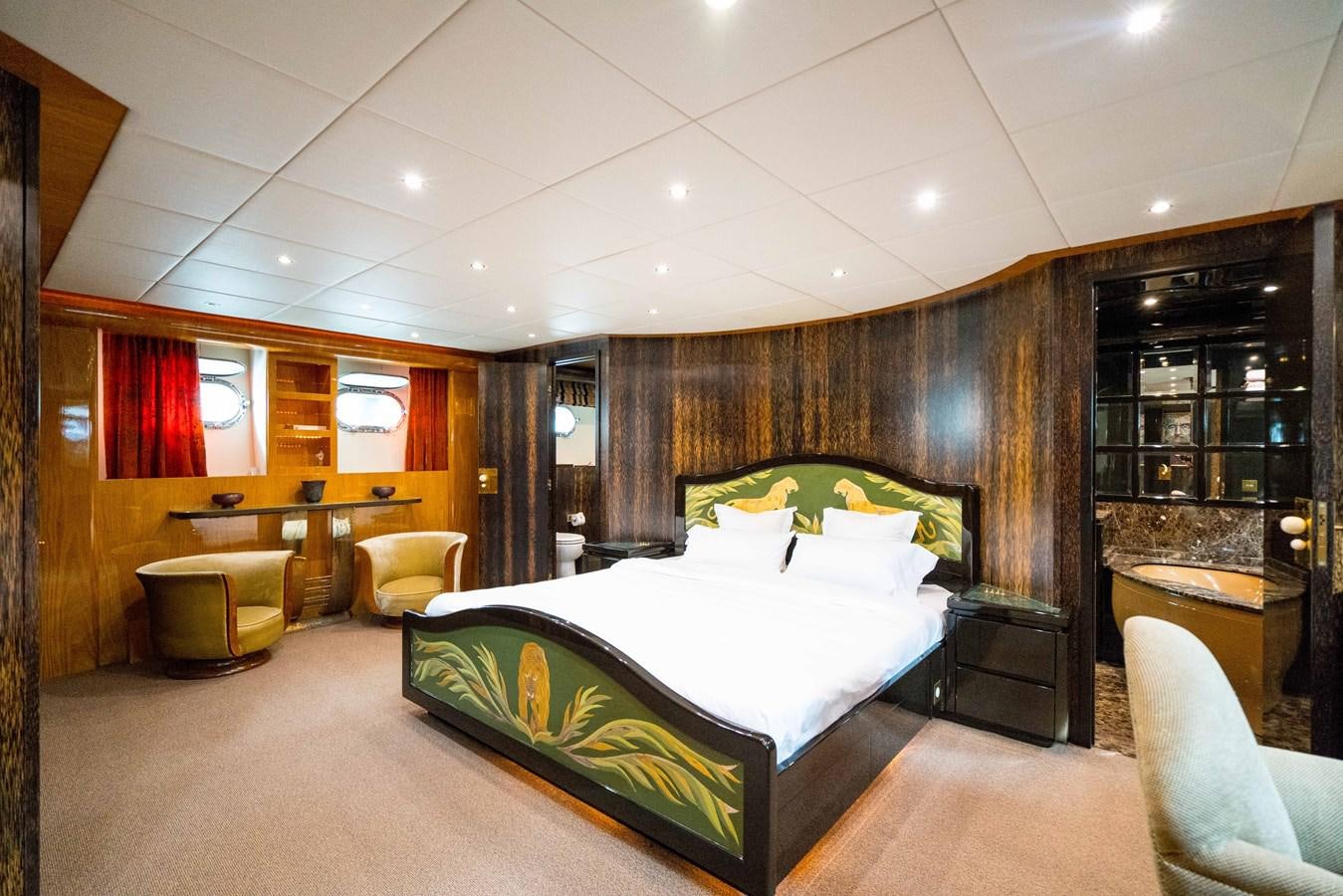 a large bedroom with a bed aboard CHASING SPIRIT Yacht for Sale