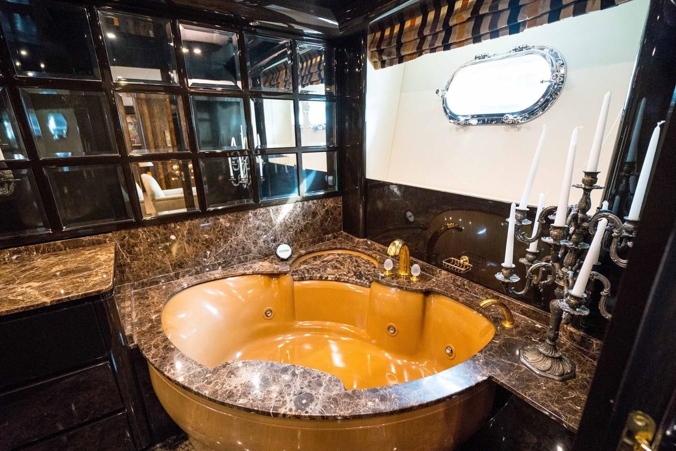 a bathroom with a large tub aboard CHASING SPIRIT Yacht for Sale
