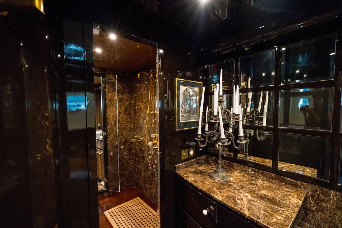 a bar with a marble counter top aboard CHASING SPIRIT Yacht for Sale