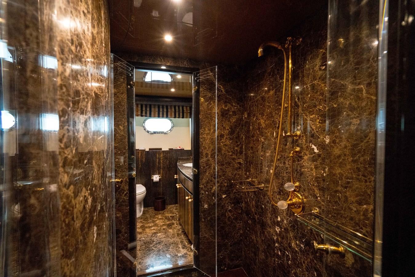 a bathroom with many wires aboard CHASING SPIRIT Yacht for Sale