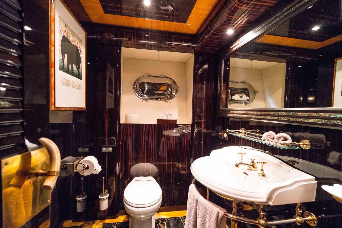 a bathroom with a sink and toilet aboard CHASING SPIRIT Yacht for Sale
