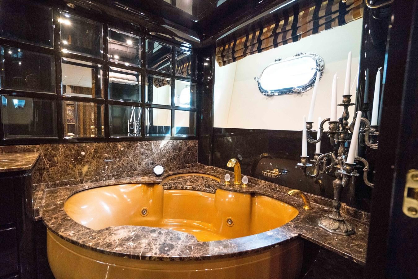a bathroom with a large sink aboard CHASING SPIRIT Yacht for Sale