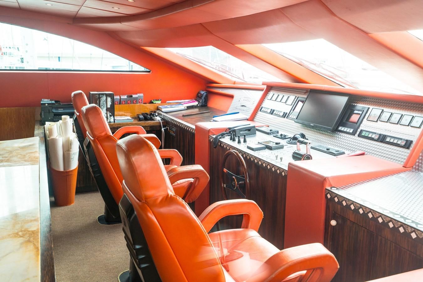 a room with a row of computers aboard CHASING SPIRIT Yacht for Sale