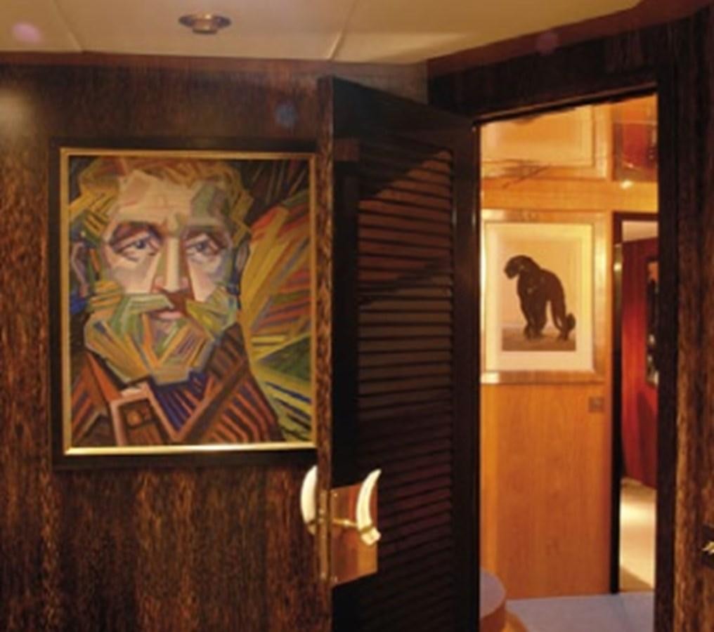 a door with pictures on it aboard CHASING SPIRIT Yacht for Sale