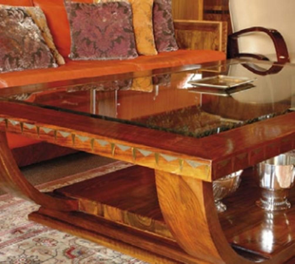 a wooden table with a glass top aboard CHASING SPIRIT Yacht for Sale