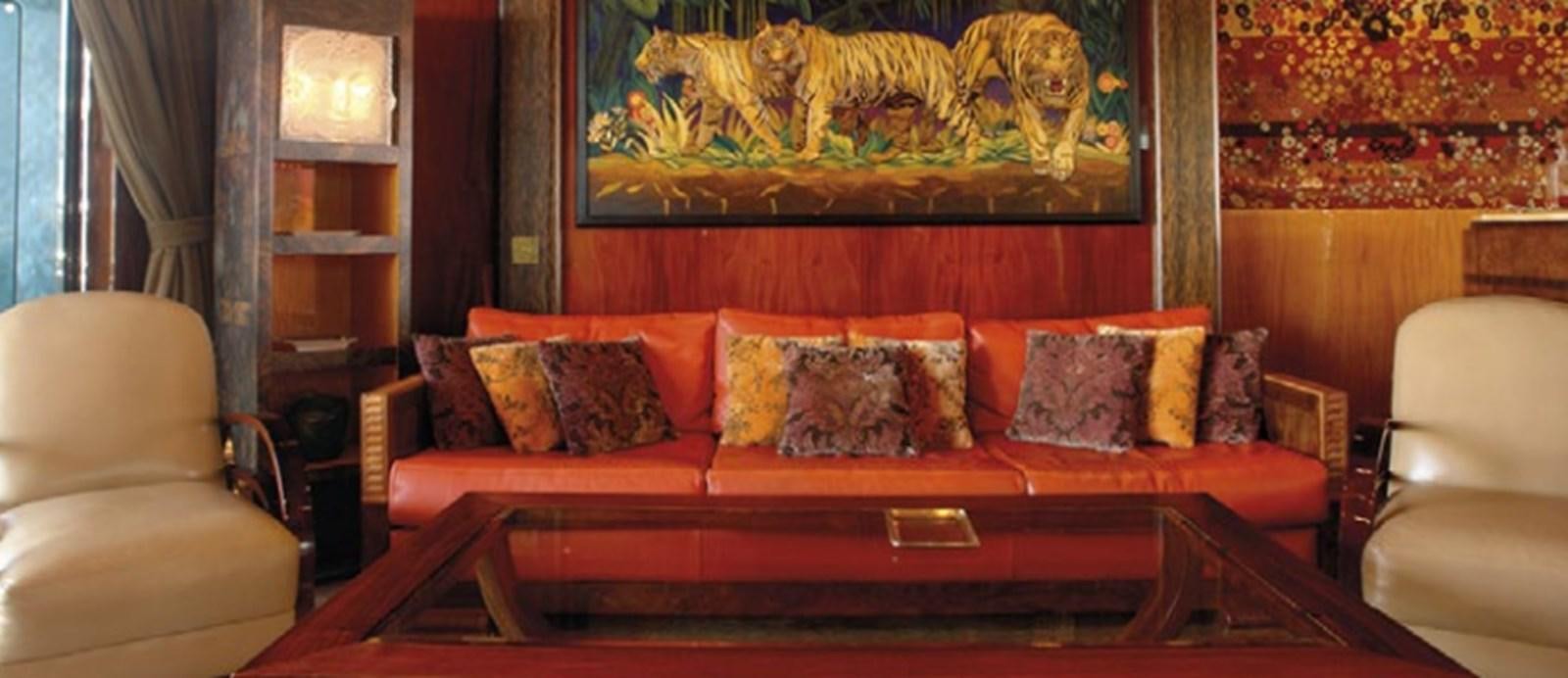 a couch with pillows aboard CHASING SPIRIT Yacht for Sale