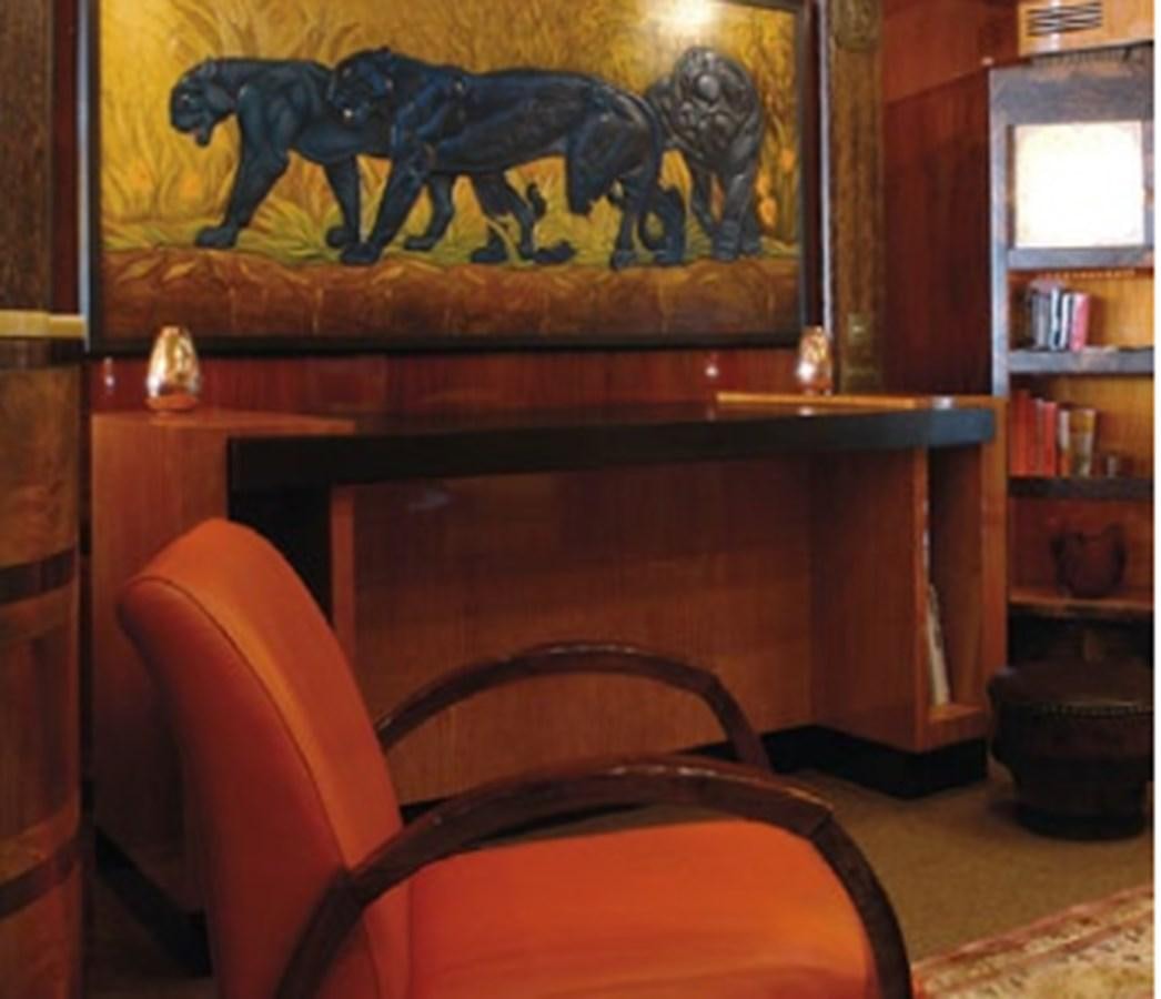 a chair in front of a desk aboard CHASING SPIRIT Yacht for Sale