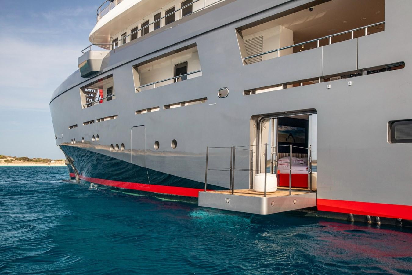 a large white ship in the water aboard AUDACE Yacht for Sale