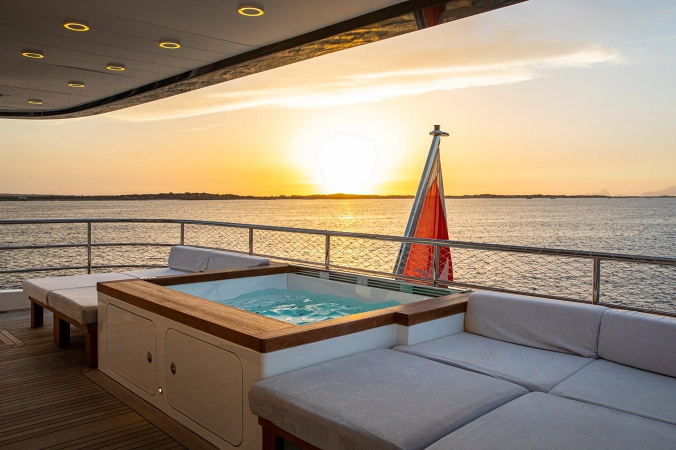 a pool on a deck overlooking the ocean aboard AUDACE Yacht for Sale