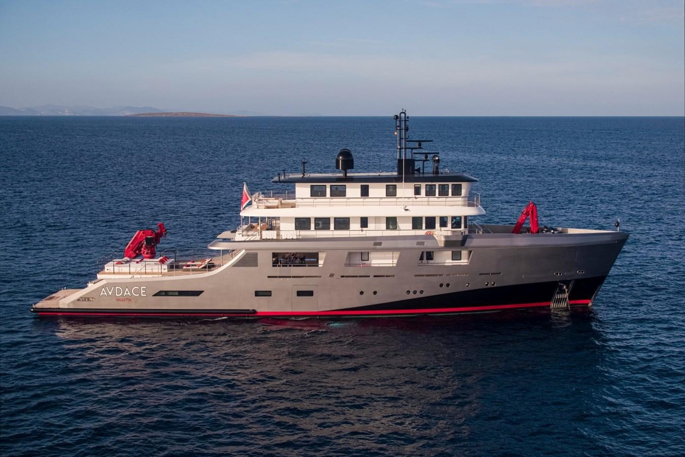 a large white boat in the water aboard AUDACE Yacht for Sale