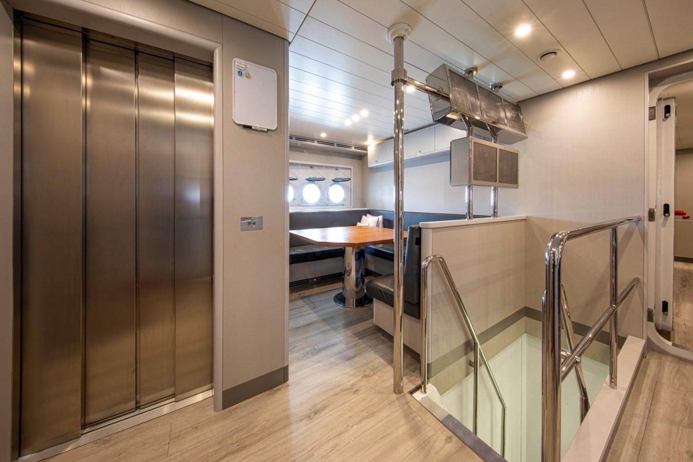 a large room with a large glass shower unit and a large metal sink aboard AUDACE Yacht for Sale