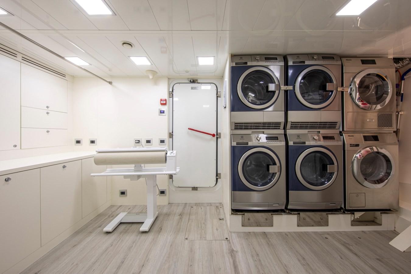 a room with large speakers aboard AUDACE Yacht for Sale