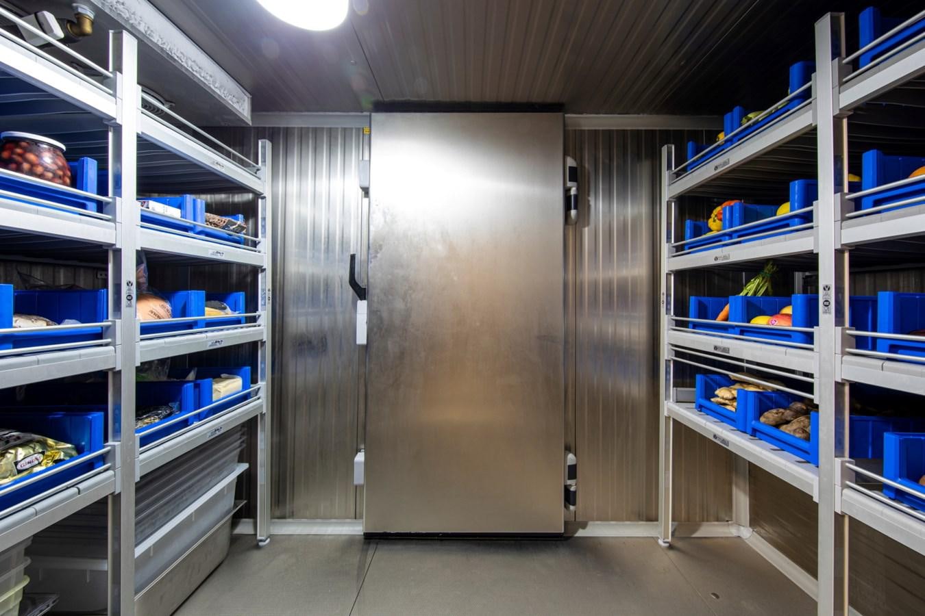 a room with a closet and shelves aboard AUDACE Yacht for Sale